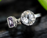 Round white topaz ring in silver bezel and amethyst on the side with sterling silver texture band