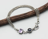 Amethyst pendant bracelet with blue kyanite gemstone on sterling silver chain