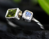 Peridot ring and moonstone with sterling silver oxidized twist band