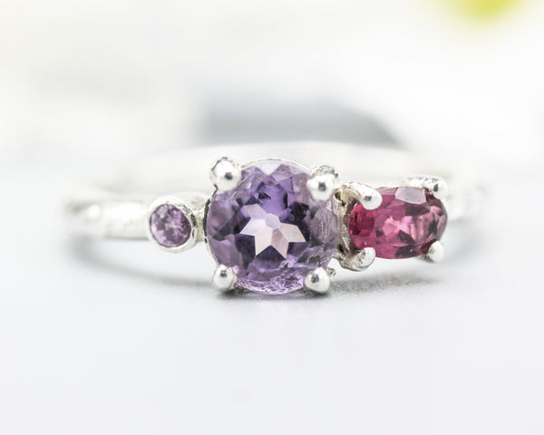 Sterling silver wedding ring with Amethyst, pink tourmaline and tiny amethyst gemstone in bezel and prongs setting