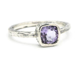 Amethyst gemstone ring in silver bezel setting with sterling silver band