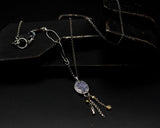 Oval purple Druzy quartz pendant necklace in silver bezel setting with spinel beads on the side and sterling silver chain