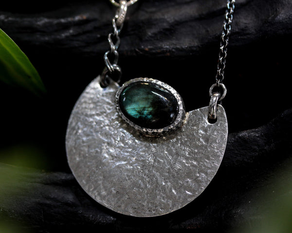 Oval Labradorite pendant necklace in silver bezel setting and silver fan shape with texture tachnique