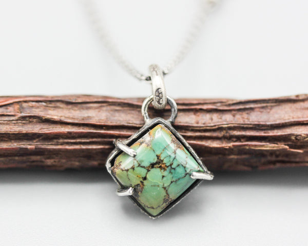 Green turquoise pendant necklace in silver bezel and prongs setting