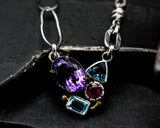 Oval amethyst pendant necklace with blue topaz, ruby and London blue topaz gemstone