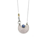 Round Blue kyanite gemstone pendant necklace with silver crescent moon shape on sterling silver chain