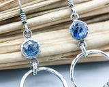 Blue kyanite earrings with silver circle and finger drops on sterling silver hooks style
