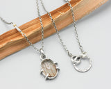 Tiny oval Rutilated quartz cabochon pendant necklace with sterling silver chain