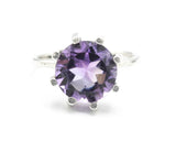 Round faceted Amethyst ring in silver prongs setting with sterling silver hammer texture band