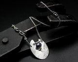 Teardrop blue sapphire pendant necklace with silver oval shape plate on sterling silver chain