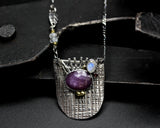 Pink sapphire and moonstone pendant necklace in silver bezel setting with silver engraving plate on sterling silver chain