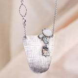 Sterling silver semi-oval pendant necklace with white Moonstone, blue kyanite, moonstone and freshwater pearls gemstone