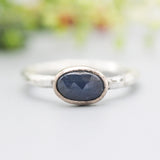 Natural Blue sapphire ring in rose gold bezel setting with sterling silver in hammer texture band