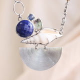 Silver fan pendant necklace with Seashell, mother of pearls, lapis lazuli and blue kyanite gemstone in silver bezel and prongs setting