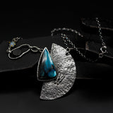 Triangle cabochon Labradorite necklace with silver fan shape on sterling silver chain