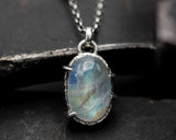 Oval Rainbow Moonstone pendant necklace in sterling silver bezel and prongs setting on sterling silver chain