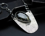 Teardrop black Rutilated pendant necklace with semi-oval silver plate on oxidized sterling silver chain