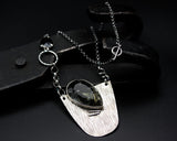 Teardrop black Rutilated pendant necklace with semi-oval silver plate on oxidized sterling silver chain