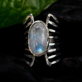 Oval Moonstone ring in silver bezel setting with sterling silver skeleton multi wrap band