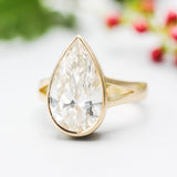 Teardrop Lab diamond ring in bezel setting with 18k gold high polish band