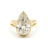 Teardrop Lab diamond ring in bezel setting with 18k gold high polish band