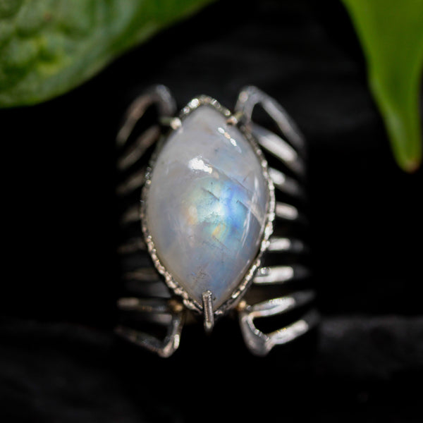 Marquis cabochon Moonstone ring in silver bezel and prongs setting with sterling silver skeleton multi wrap band