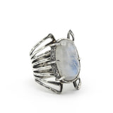 Oval cabochon Moonstone ring in silver bezel and prongs setting with sterling silver skeleton multi wrap band