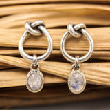 Oval moonstone with silver teardrop knot design stud earrings on sterling silver post and backing
