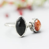 Marquise faceted Black Onyx ring with Sunstone on sterling silver hard texture band