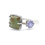 Square turquoise ring in silver bezel and prongs setting with tiny tanzanite on the side with sterling silver texture band