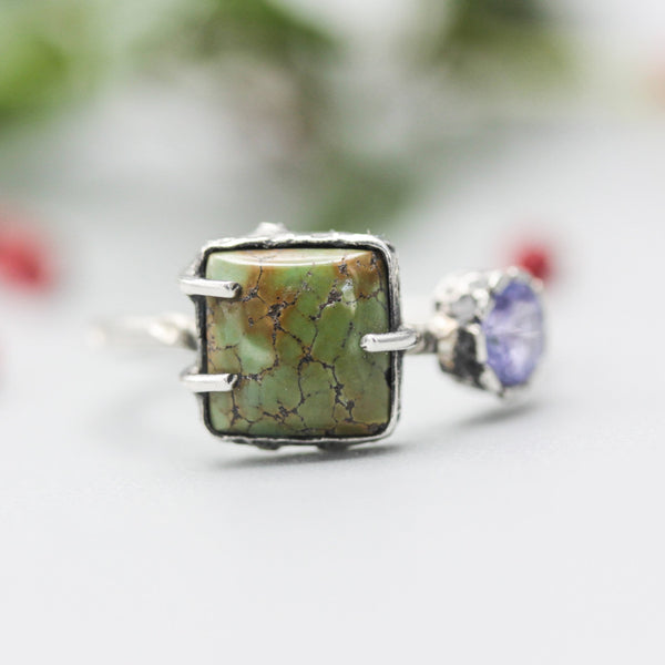 Square turquoise ring in silver bezel and prongs setting with tiny tanzanite on the side with sterling silver texture band