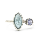 Marquise faceted Paraiba Kyanite ring in silver bezel setting with round tanzanite on sterling silver hard texture band