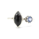 Marquise faceted Black Onyx ring with Blue sapphire on sterling silver hard texture band