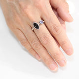 Marquise faceted Black Onyx ring with Blue sapphire on sterling silver hard texture band