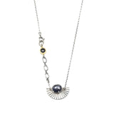 Blue sapphire pendant necklace in silver bezel and prongs with silver fan oxidized engraving on sterling silver chain