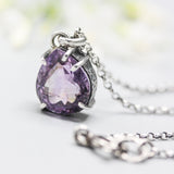 Faceted teardrop Amethyst necklace in silver bezel and prongs setting with oxidized sterling silver chain