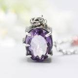 Faceted oval Amethyst necklace in silver bezel and prongs setting with oxidized sterling silver chain