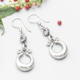 Silver pot luck coin earrings with Amethyst gemstone and hooks style on the top