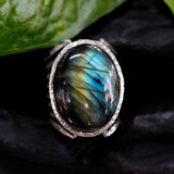 Oval Labradorite ring in silver bezel setting with sterling silver skeleton multi wrap band