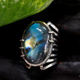 Oval blue Labradorite ring in silver bezel and prongs setting with sterling silver skeleton multi wrap band