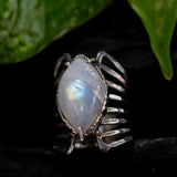 Marquis cabochon Moonstone ring in silver bezel and prongs setting with sterling silver skeleton multi wrap band