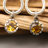 Faceted round Citrine with silver teardrop knot design stud earrings on sterling silver post and backing
