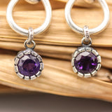 Faceted round Amethyst with silver teardrop knot design stud earrings on sterling silver post and backing