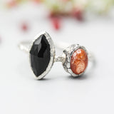 Marquise faceted Black Onyx ring with Sunstone on sterling silver hard texture band