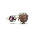 Round faceted Moss agate ring in silver bezel setting with garnet on oxidized sterling silver band