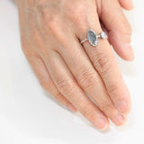 Marquise faceted Paraiba Kyanite ring in silver bezel setting with round Moonstone on sterling silver hard texture band