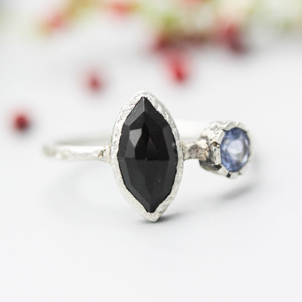 Marquise faceted Black Onyx ring with Blue sapphire on sterling silver hard texture band