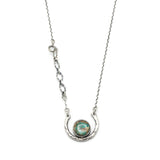 Turquoise pendant necklace with silver circle loop and sterling silver chain