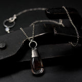 Rhodolite gardens quartz pendant necklace with oval cabochon moonstone on the side on sterling silver chain