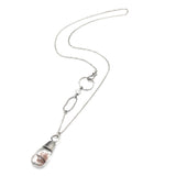 Rhodolite gardens quartz pendant necklace with oval cabochon moonstone on the side on sterling silver chain